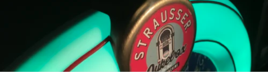 Strausser turntable glowing under coloured LED light