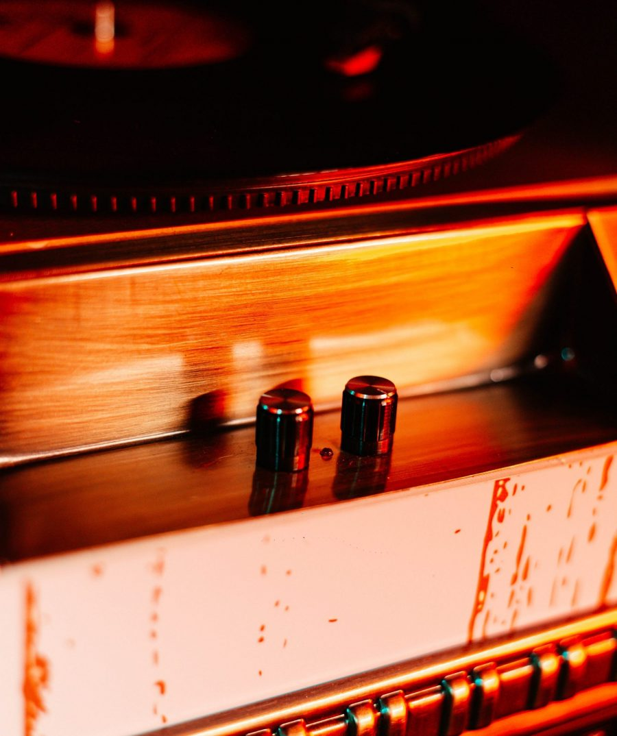 Warm-lit detail of a Strausser jukebox interior